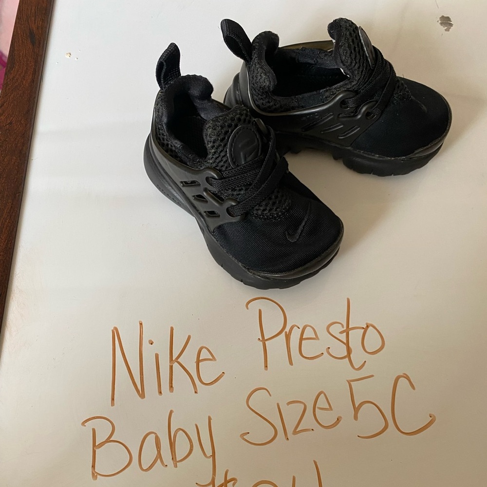 Nike Black Sneakers with Sporty Design